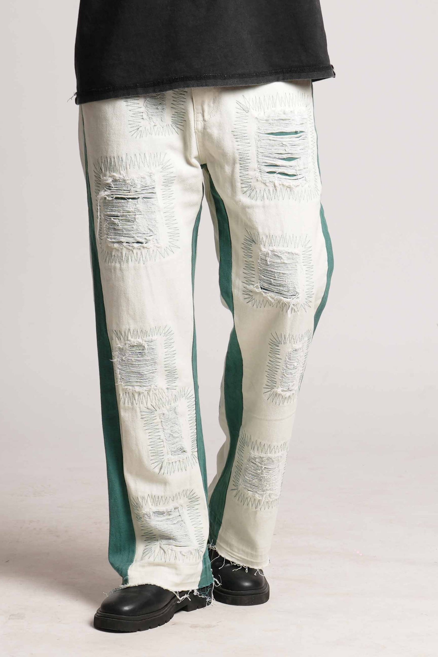 DISTRESSED PATCHWORK GREEN FLARED VALKYRE JEANS