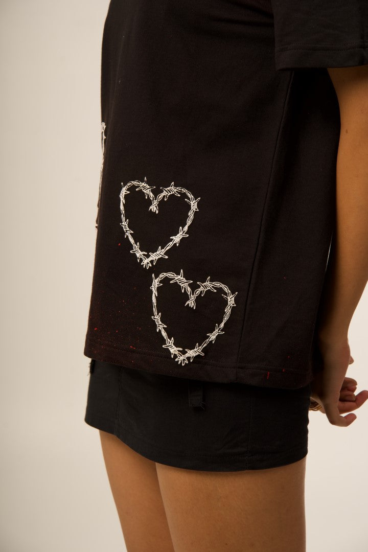 'ALL YOU NEED IS LOVE' BLACK PUFF SPLATTER TEE