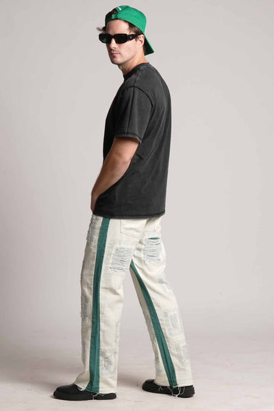 DISTRESSED PATCHWORK GREEN FLARED VALKYRE JEANS