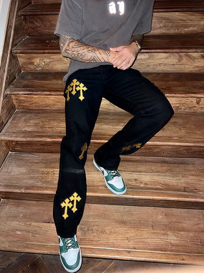 'DIRTY MONEY' PAINTED GOLD CROSS VALKYRE JEANS