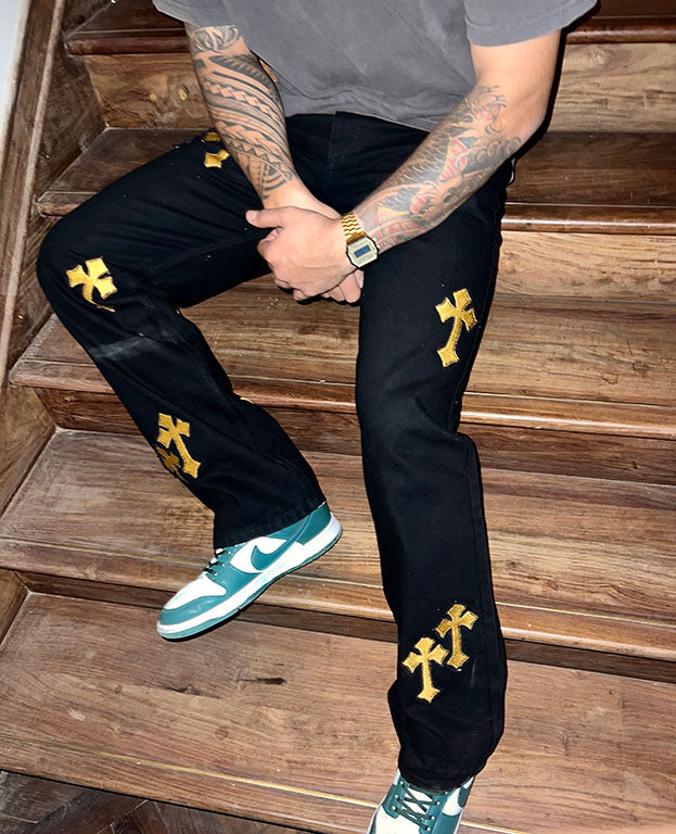 'DIRTY MONEY' PAINTED GOLD CROSS VALKYRE JEANS